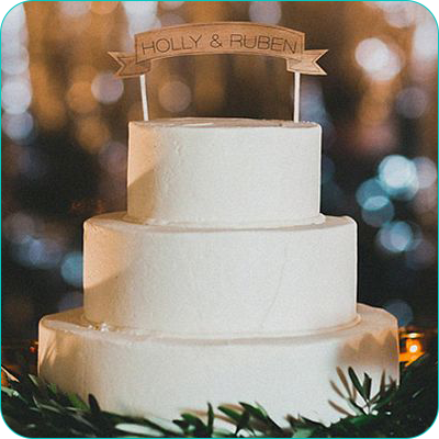 Three tier white wedding cake